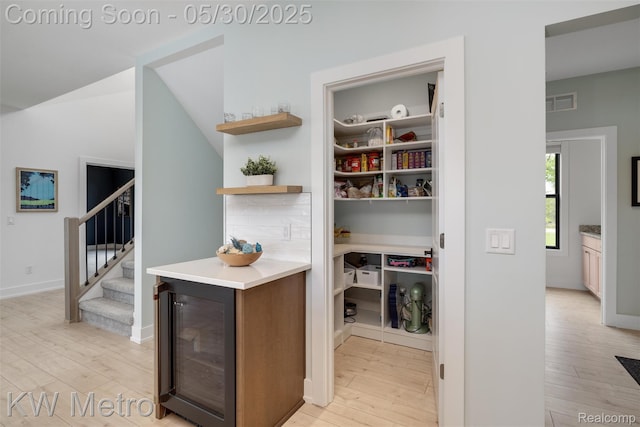 1585 Kriss Crossing Rd, Brighton, MI 48114 - storage area with beverage cooler