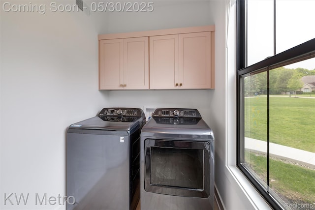 1585 Kriss Crossing Rd, Brighton, MI 48114 - washroom with cabinet space and independent washer and dryer