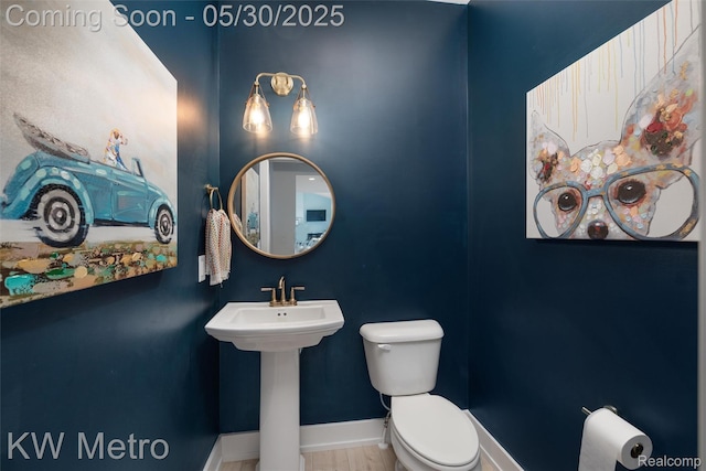 1585 Kriss Crossing Rd, Brighton, MI 48114 - half bathroom with toilet and baseboards
