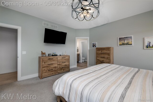 1585 Kriss Crossing Rd, Brighton, MI 48114 - carpeted bedroom featuring baseboards