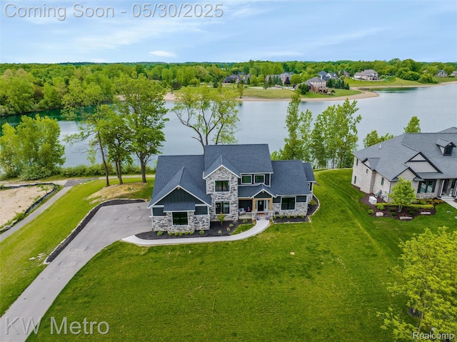 1585 Kriss Crossing Rd, Brighton, MI 48114 - view from above of property featuring a large body of water