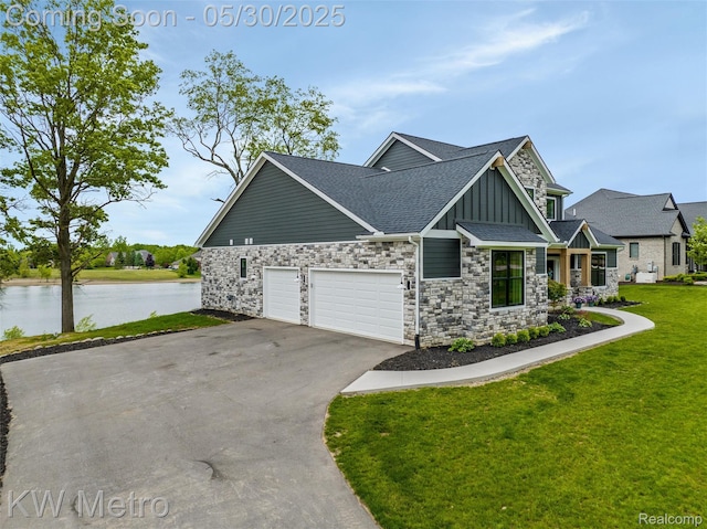 1585 Kriss Crossing Rd, Brighton, MI 48114 - view of front of home featuring board and batten siding, driveway, a water view, and stone siding