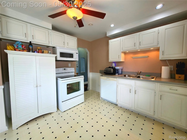 3026 N Blair Ave, Royal Oak, MI 48073 - kitchen with white appliances, a sink, light floors, white cabinetry, and recessed lighting