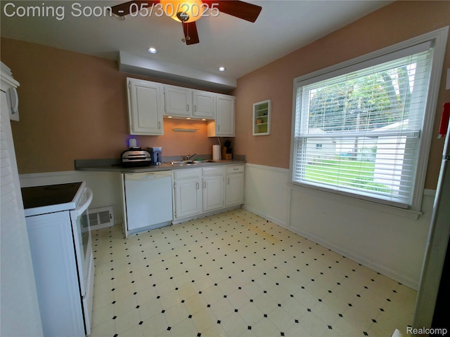 3026 N Blair Ave, Royal Oak, MI 48073 - kitchen with white appliances, ceiling fan, white cabinets, a sink, and light floors