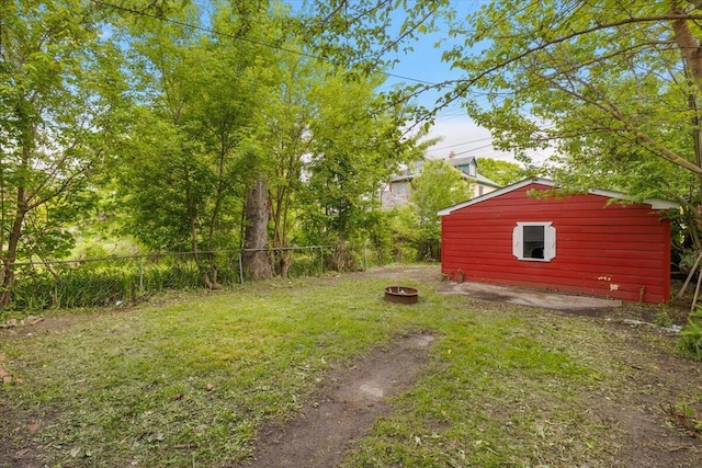 608 Mount Vernon St, Detroit, MI 48202 - view of yard featuring an outdoor fire pit and an outbuilding