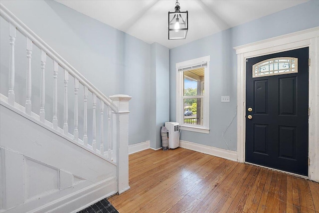 608 Mount Vernon St, Detroit, MI 48202 - entrance foyer with hardwood / wood-style floors, baseboards, and stairway
