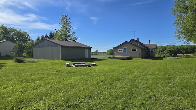 1301 US Highway 10, Scottville, MI 49454 - view of green lawn with an outbuilding and an outdoor structure