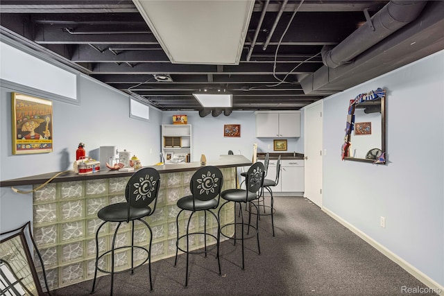 3072 Brewster, West Bloomfield, MI 48322 - indoor bar featuring baseboards and dark colored carpet