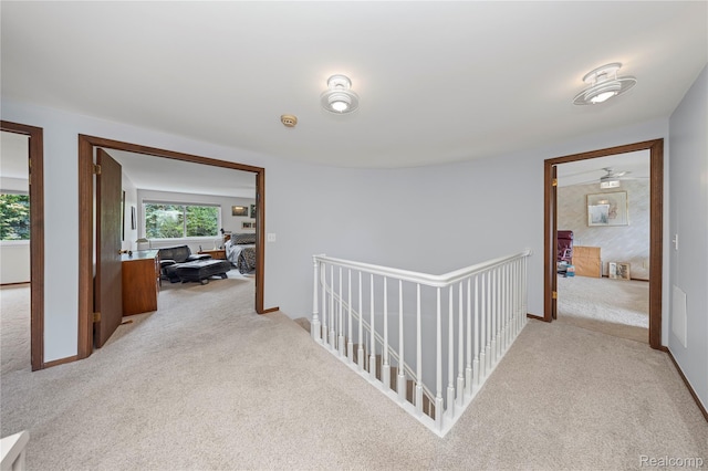 3072 Brewster, West Bloomfield, MI 48322 - hall featuring light colored carpet and an upstairs landing