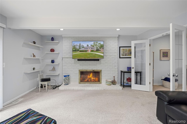 3072 Brewster, West Bloomfield, MI 48322 - carpeted living room with french doors, a fireplace, and recessed lighting