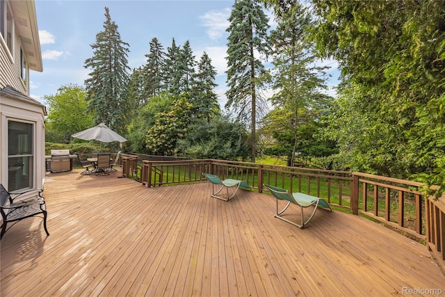 3072 Brewster, West Bloomfield, MI 48322 - wooden deck with a grill, outdoor dining space, and view of scattered trees