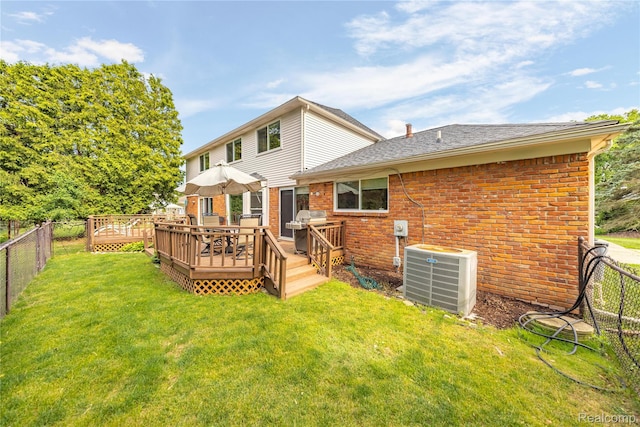 3072 Brewster, West Bloomfield, MI 48322 - back of house with brick siding, roof with shingles, and a wooden deck