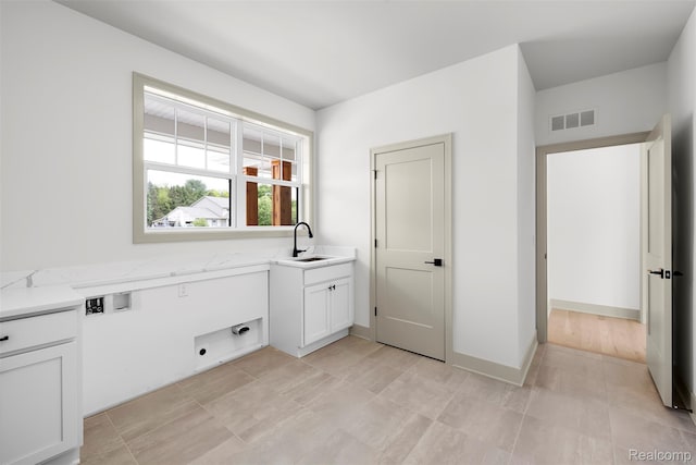 3097 Gecko Trl, Pinckney, MI 48169 - washroom with cabinet space, hookup for a washing machine, and electric dryer hookup
