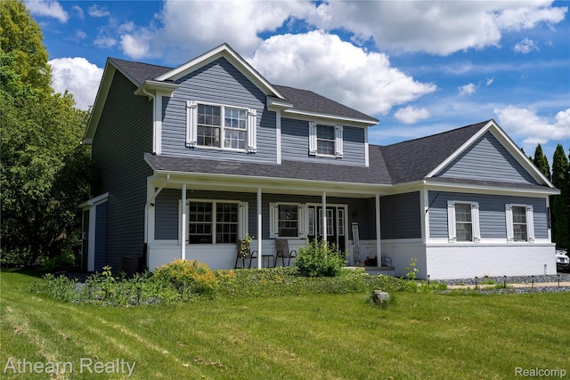 16429 E Horseshoe Trl, Linden, MI 48451 - view of front facade featuring a front lawn, covered porch, and a shingled roof