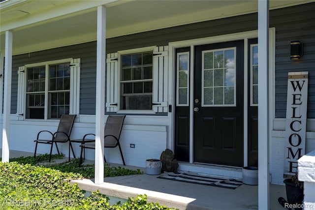 16429 E Horseshoe Trl, Linden, MI 48451 - property entrance with a porch