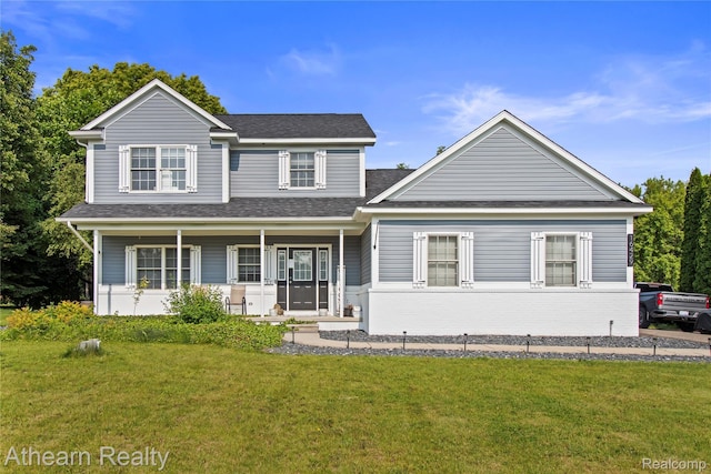 16429 E Horseshoe Trl, Linden, MI 48451 - view of front of property featuring a front lawn, a porch, and a shingled roof