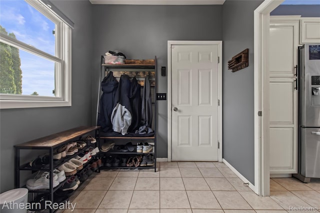 16429 E Horseshoe Trl, Linden, MI 48451 - mudroom featuring light tile patterned floors