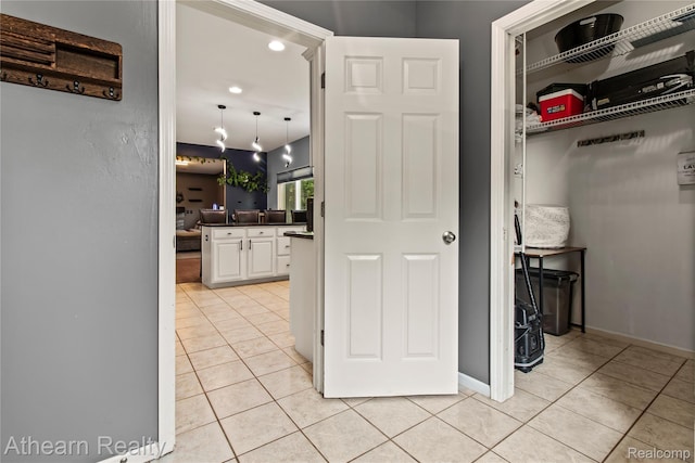 16429 E Horseshoe Trl, Linden, MI 48451 - corridor with light tile patterned flooring