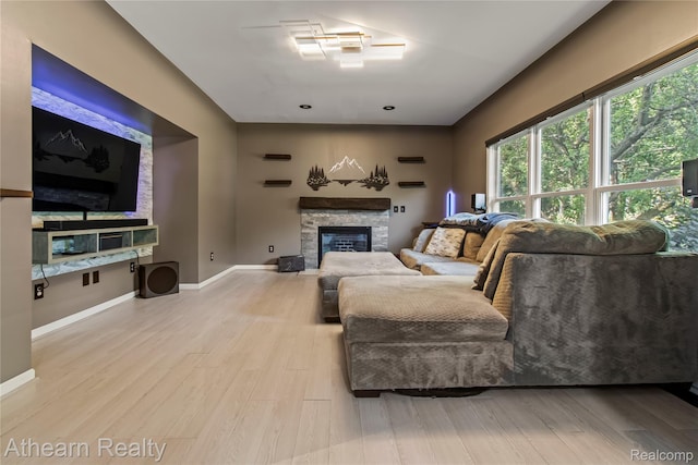 16429 E Horseshoe Trl, Linden, MI 48451 - living room with a fireplace and wood finished floors