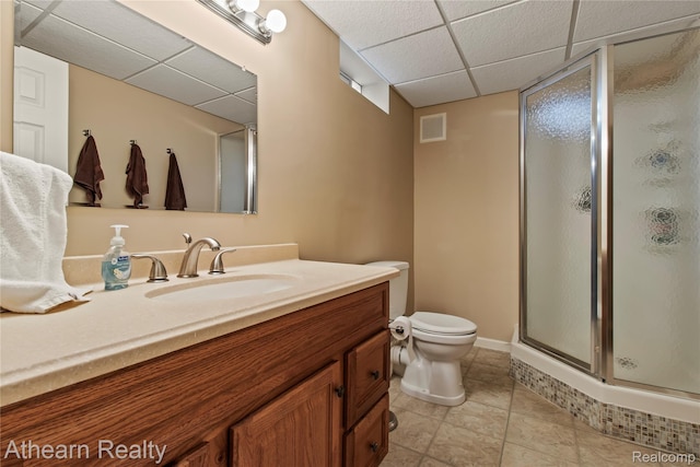 16429 E Horseshoe Trl, Linden, MI 48451 - bathroom with vanity, a shower stall, a drop ceiling, and tile patterned floors