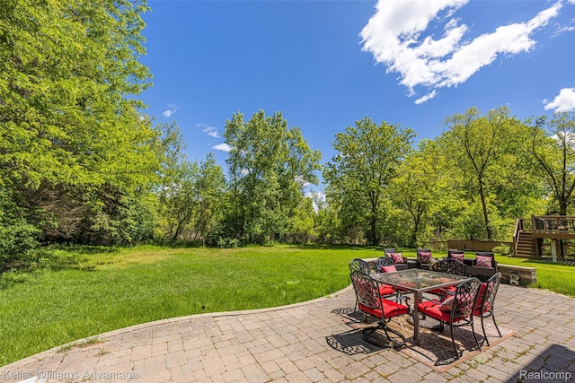42900 Ledgeview Dr, Novi, MI 48377 - view of patio with stairs, outdoor dining area, and a deck