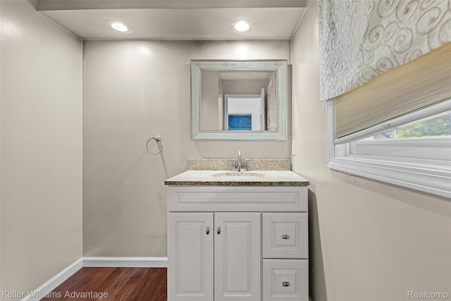 42900 Ledgeview Dr, Novi, MI 48377 - bathroom with wood finished floors, baseboards, and vanity
