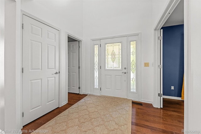 42900 Ledgeview Dr, Novi, MI 48377 - entryway featuring dark wood-type flooring, baseboards, and a high ceiling