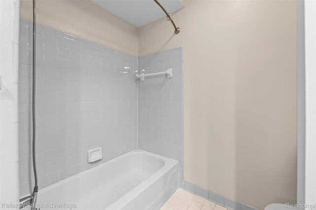 42900 Ledgeview Dr, Novi, MI 48377 - full bathroom with tile patterned flooring, washtub / shower combination, toilet, and baseboards