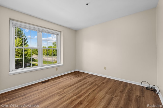 42900 Ledgeview Dr, Novi, MI 48377 - unfurnished room featuring baseboards and wood finished floors