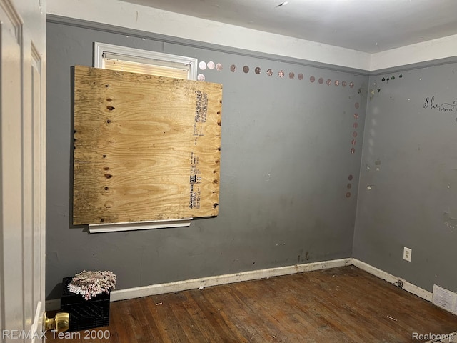 8505 Heyden St, Detroit, MI 48228 - unfurnished room featuring wood-type flooring and baseboards
