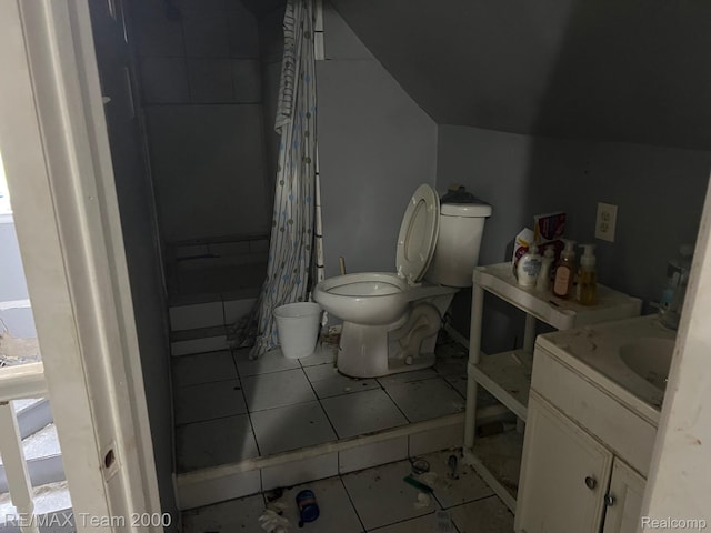 8505 Heyden St, Detroit, MI 48228 - bathroom featuring toilet, tile patterned flooring, vanity, and a shower with curtain