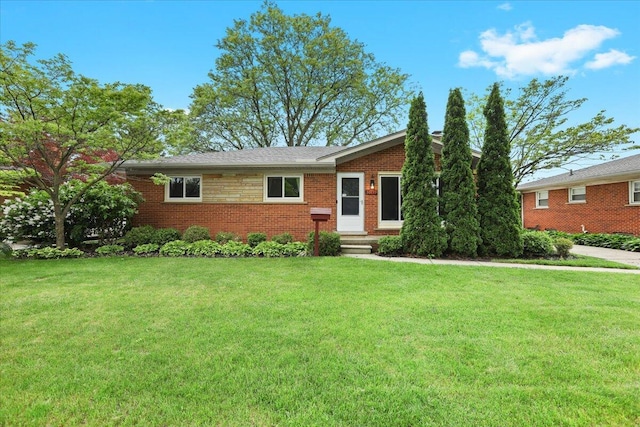 30139 Bentley St, Livonia, MI 48154 - ranch-style home featuring a front yard, entry steps, and brick siding