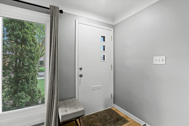 30139 Bentley St, Livonia, MI 48154 - doorway to outside with wood finished floors and baseboards
