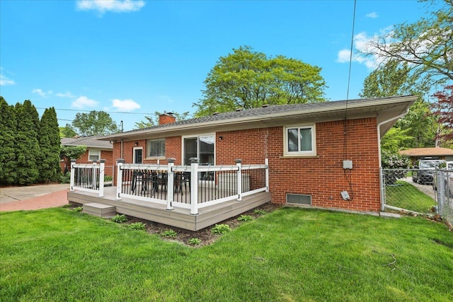 30139 Bentley St, Livonia, MI 48154 - rear view of house with brick siding, a wooden deck, and a chimney