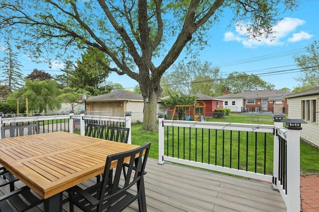 30139 Bentley St, Livonia, MI 48154 - wooden deck featuring outdoor dining space and an outdoor structure