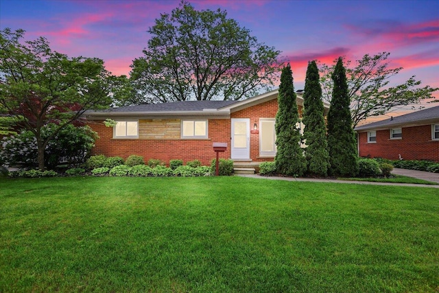 30139 Bentley St, Livonia, MI 48154 - ranch-style home featuring entry steps, a yard, and brick siding