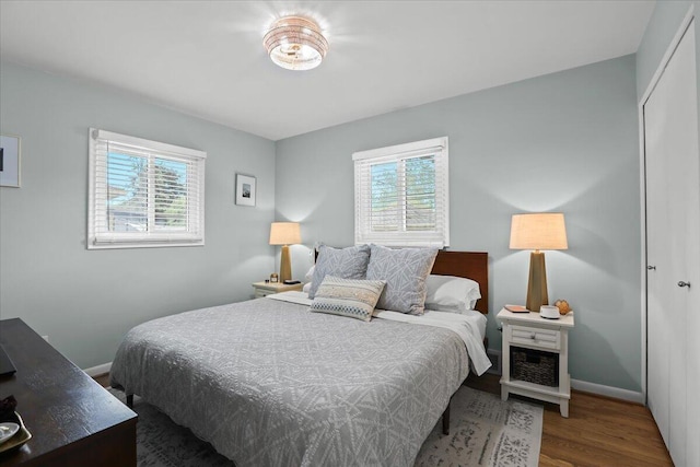 30139 Bentley St, Livonia, MI 48154 - bedroom with wood finished floors and baseboards