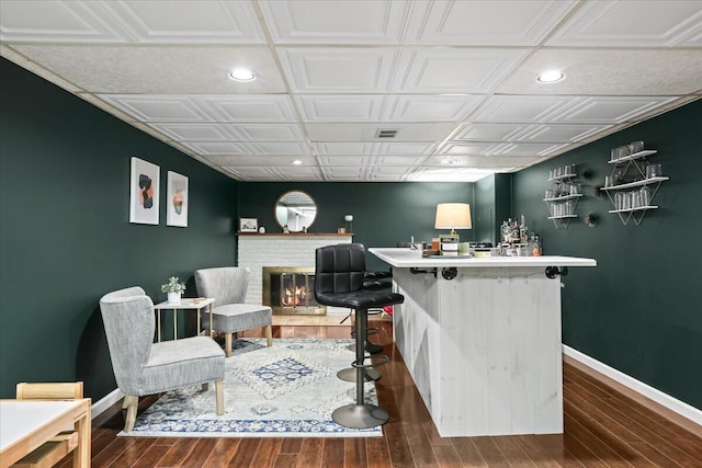 30139 Bentley St, Livonia, MI 48154 - indoor bar with baseboards, wood finished floors, recessed lighting, an ornate ceiling, and a fireplace