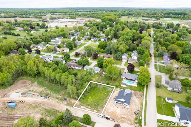 322 E Ash St NE, Cedar Springs, MI 49319 - aerial view of residential area featuring property parcel outlined