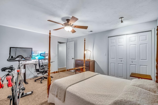 9180 Dicey St, Montague, MI 49437 - carpeted bedroom with an office area, ceiling fan, and a closet