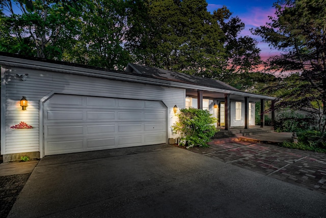 9180 Dicey St, Montague, MI 49437 - view of front of property featuring driveway and an attached garage