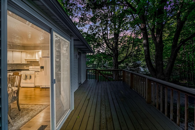 9180 Dicey St, Montague, MI 49437 - view of deck at dusk