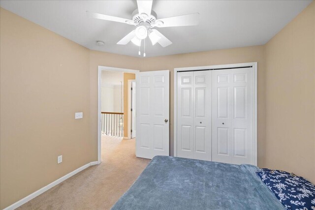 1269 Apple Creek Dr SE, Grand Rapids, MI 49546 - bedroom featuring carpet flooring, baseboards, a ceiling fan, and a closet