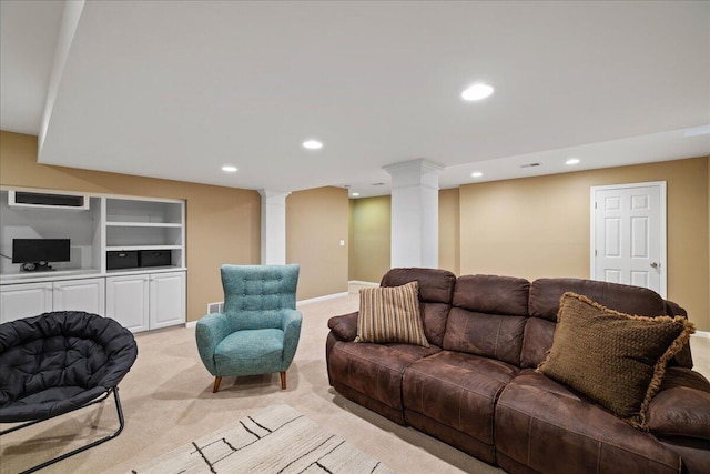 1269 Apple Creek Dr SE, Grand Rapids, MI 49546 - living room with decorative columns, light colored carpet, recessed lighting, and baseboards