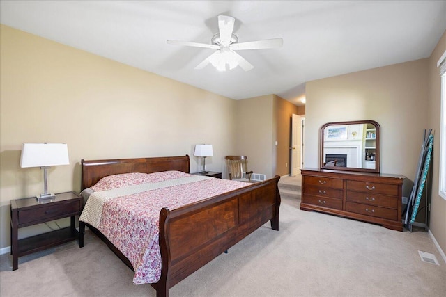 1269 Apple Creek Dr SE, Grand Rapids, MI 49546 - bedroom with light colored carpet, baseboards, and ceiling fan