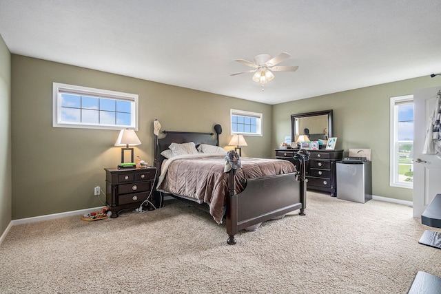 69218 Sundance Dr, Edwardsburg, MI 49112 - bedroom with carpet floors, baseboards, fridge, and a ceiling fan