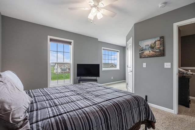 69218 Sundance Dr, Edwardsburg, MI 49112 - carpeted bedroom with baseboards and ceiling fan