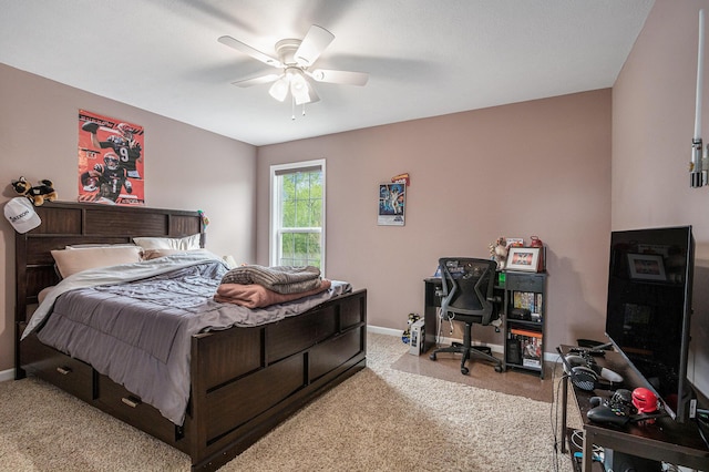 69218 Sundance Dr, Edwardsburg, MI 49112 - bedroom with light colored carpet, baseboards, and ceiling fan