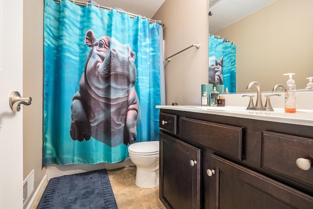 69218 Sundance Dr, Edwardsburg, MI 49112 - full bathroom with toilet, vanity, a shower with curtain, and tile patterned floors