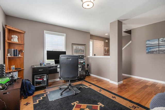 69218 Sundance Dr, Edwardsburg, MI 49112 - home office featuring wood finished floors and baseboards
